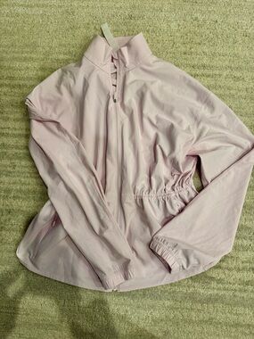 Baby pink cinch waist lulu lemon light weight zip up with pockets size m